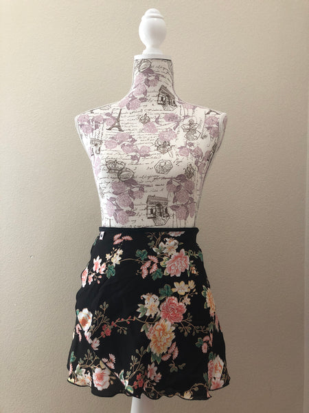 Flowers in black wrap skirt