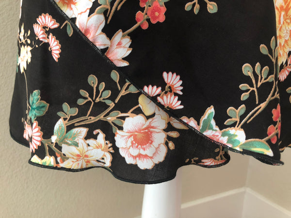 Flowers in black wrap skirt